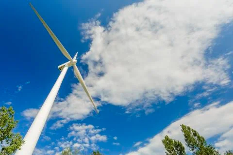 Wind power generating stations in the park Stock Photos