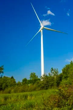 Wind power generating stations in the park Stock Photos