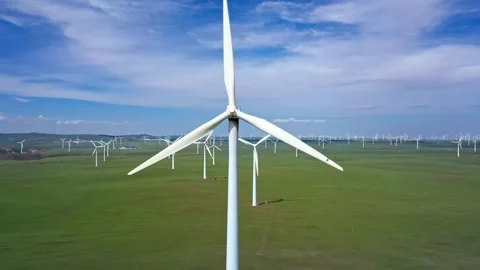 Wind power generation in grasslands and hills slow motion Video stock 327472704