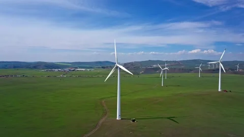 Wind power generation in grasslands and hills slow motion Video stock 327472740