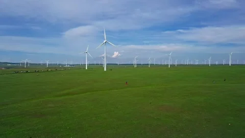 Wind power generation in grasslands and hills slow motion Video stock 327473178