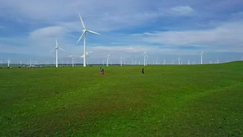 Wind power generation in grasslands and hills slow motion Stock Footage 327473179