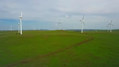 Wind power generation in grasslands and hills slow motion Stock Footage 327473343