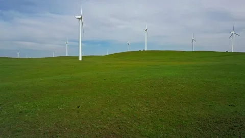 Wind power generation in grasslands and hills slow motion Stock Footage 327473890