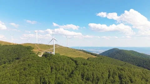 Wind Power Generation in the Mountains of Bulgaria Captured by Aerial Drone Stock Footage 313545962