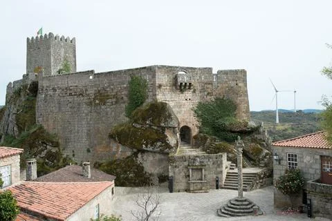 Wind power generation next to Sortelha castle Stock Photos
