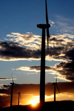 Wind power generator silhouette Stock Photos