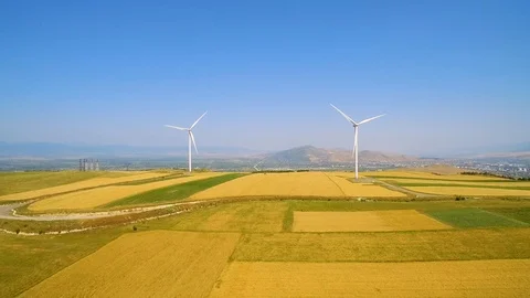 Wind power generators and yellow field aerial view 스톡 동영상 94536271