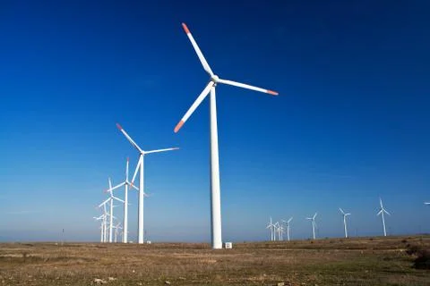 Wind power generators with blue clear sky Stock Photos
