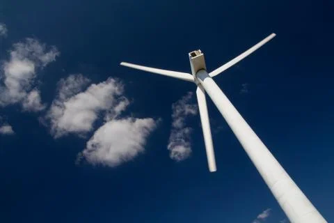 Wind power generators on blue sky Stock Photos
