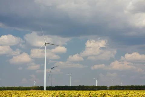 Wind power generators on blue sky Stock Photos