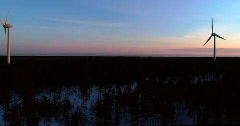 Wind power generators, Cinema 4k aerial view towards a power plant with sever Stock Footage 87775673