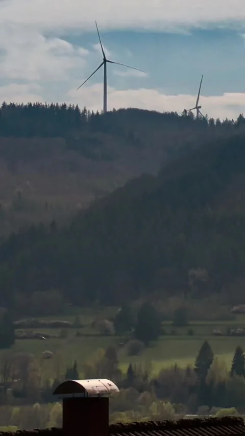Wind power generators for electricity on a mountain in a vertical time-laps.. Stock-Footage 239902195