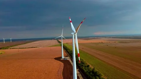 Wind power generators in the fields Corn fields of the Caucasus Republic of Stock Footage 137097943
