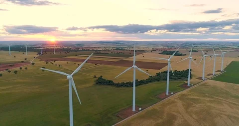 Wind power industry - group of wind turbines generate renewable electricity Stock Footage 106448661
