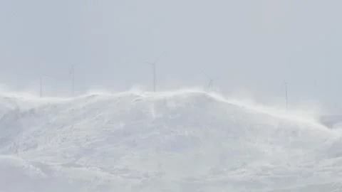 Wind power plant on winter storm Stock Footage 256984955