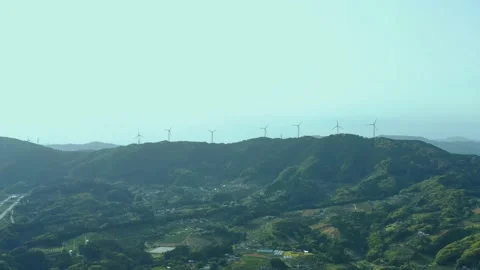 Wind power plants on mountain peak. Renewable energy. Clean energy. Stock Footage 155664572