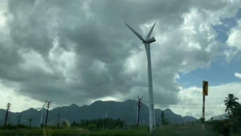 Wind power station with cloudy sky background Stock Footage 167701428