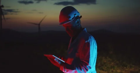 Wind power station technician working at ecological field using modern tablet Stock Footage 117137236