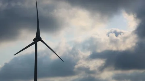 Wind Power Turbine with Flowing Clouds Stock Footage 344913434