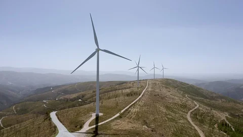 Wind power turbines generating clean renewable energy. Portugal Stock Footage 128631871