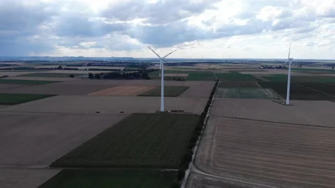 Wind power turbines generating clean renewable energy for sustainable Stock Footage 138866521