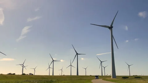 Wind power turbines generating clean renewable energy. Video stock 198665411