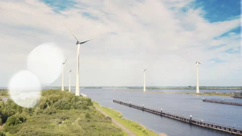 Wind power turbines generating clean renewable energy. Slow motion Stockbeeldmateriaal 199855299
