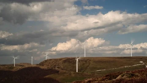 Wind Power Turbines Park and Piling Up Clouds High in the Mountains Time Lapse Stock Footage 195044397