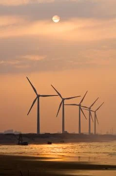 Wind power under sunset 스톡 사진