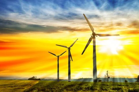 Wind power under sunset Stock Photos