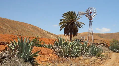 Wind powered water pump mid shot Stock Footage 39243377