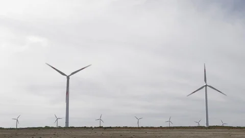 Wind producing energy to wind turbines, Paul da Serra, Madeira island, Portugal Stock Footage 119763440