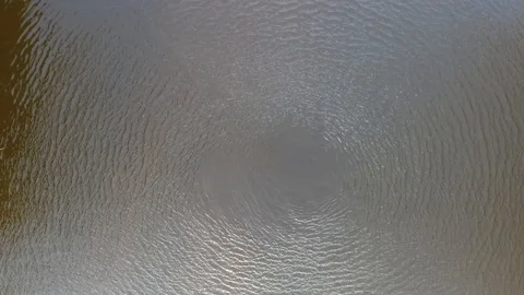 The wind from the propellers makes the waves in the water Stock Footage 95992454