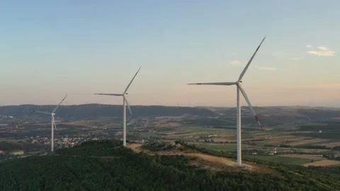 Wind roses that generate energy at sunset Stock Footage 148499135