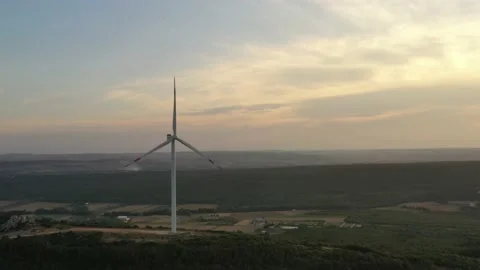 Wind roses that generate energy at sunset Stock Footage 148499826