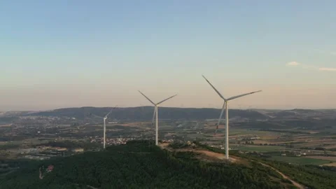 Wind roses that generate energy at sunset Stock Footage 148500536