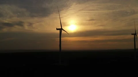 Wind roses that generate energy at sunset Stock Footage 148501544