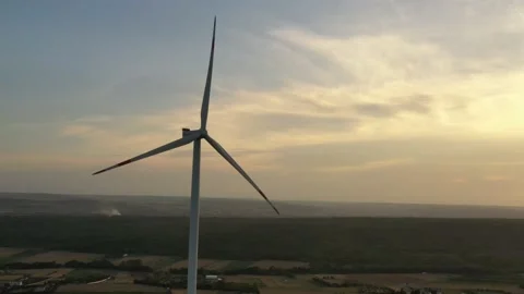 Wind roses that generate energy at sunset Stock Footage 148501598