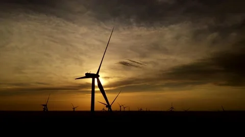 Wind roses that generate energy at sunset Stock Footage 148522448