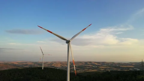 Wind roses that generate energy at sunset Stock Footage 148522959