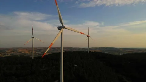 Wind roses that generate energy at sunset Stock Footage 148525092