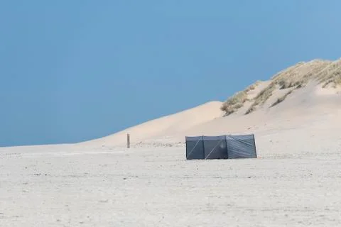 Wind screen on the beach. Stock Photos