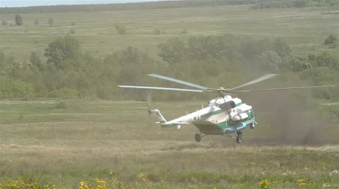 Wind shot Special force soldiers exit from a helicopter at battlefield Stock Footage 65291828