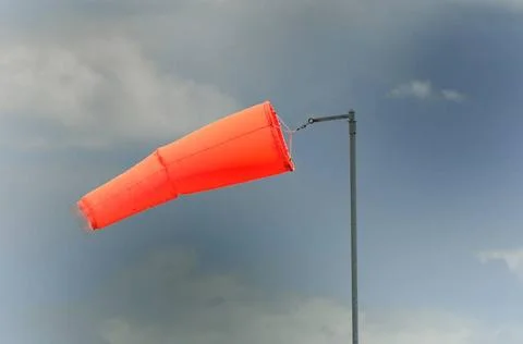 Wind sock with cloud background Wind sock with stormy background Copyright... Foto stock