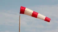 Wind Sock Flutters At Background Of Sky With Clouds Stock Footage