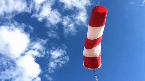 Wind Sock Vane with Clouds and Blue Sky. Stock Footage 102033739