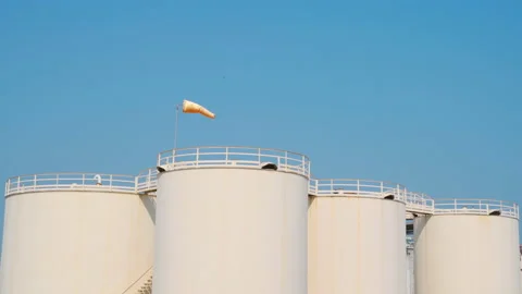 Wind socks at the petroleum stroage tank Stock Footage 172034989