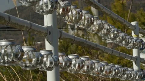 Wind Spinners Made From Aluminium Cans. Stock Footage 235396381