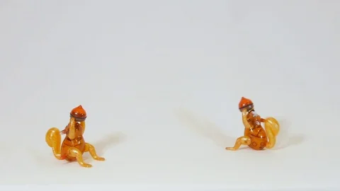 Wind Up Squirrels with Acorns Stock Footage 100691201